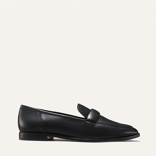 Margaux's structured Andie Loafer, made in a soft, black Italian nappa leather with a plush, padded keeper