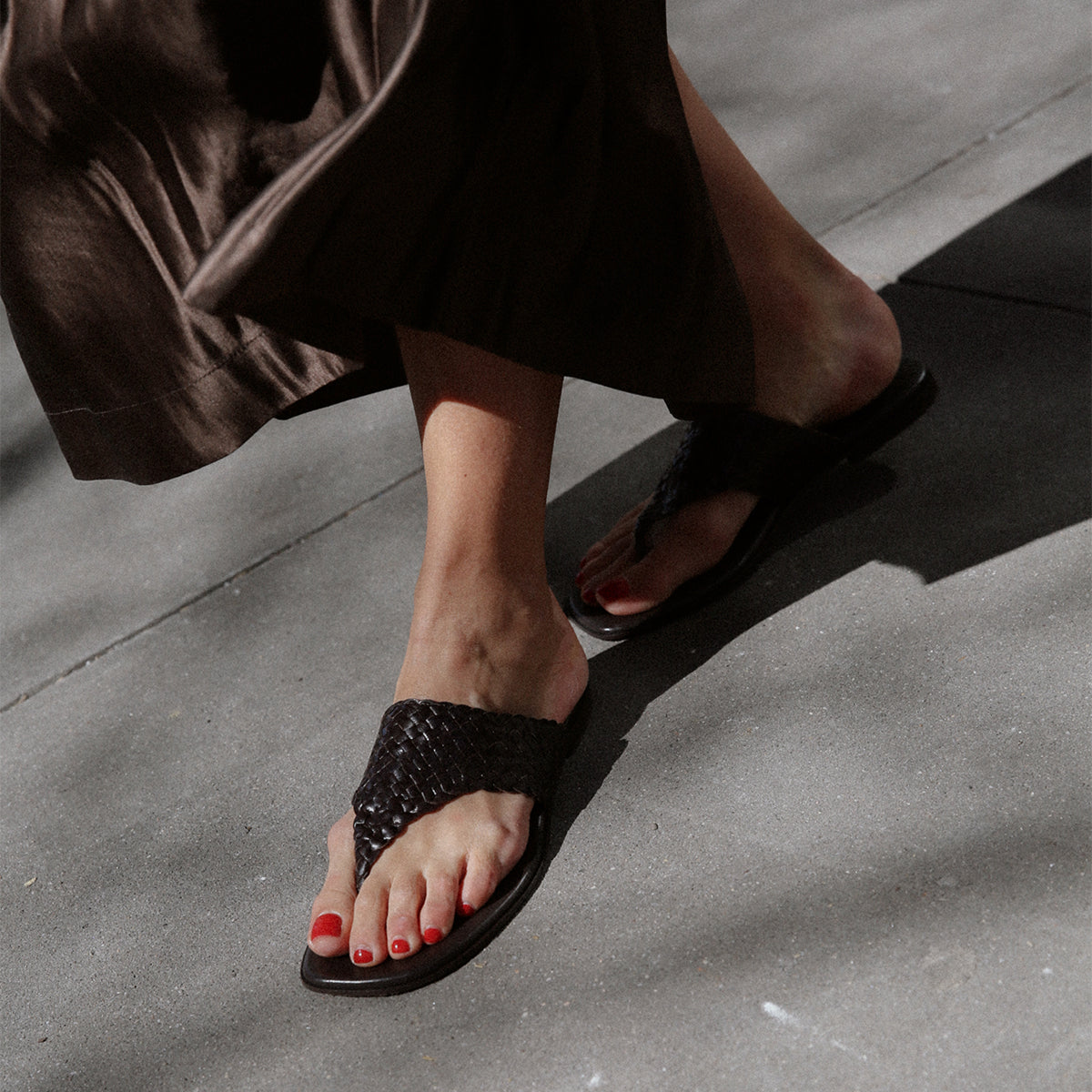 Brown woven leather thong sandals