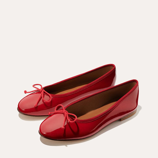 Margaux's classic and comfortable Demi ballet flat, made in a soft, cherry red Italian patent leather