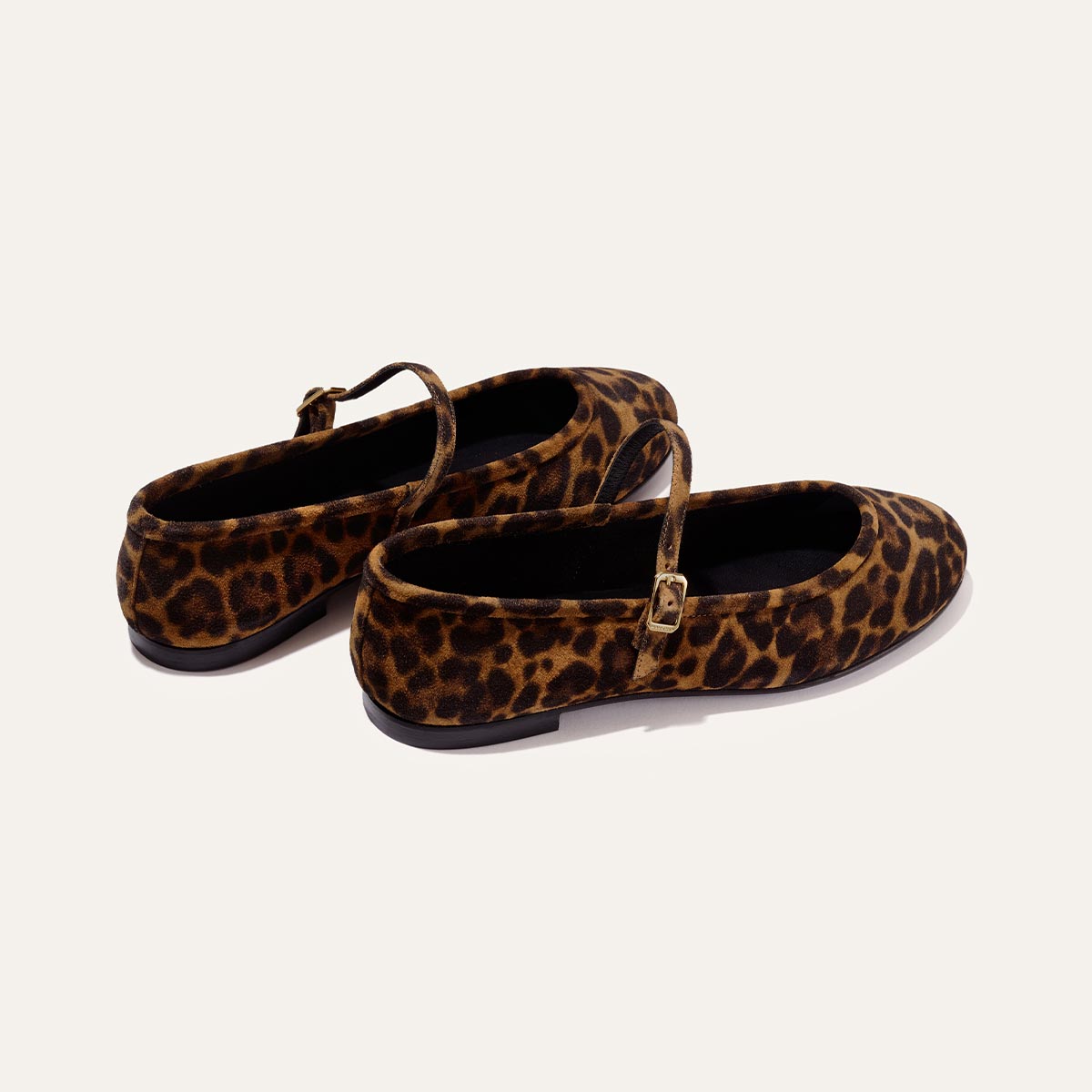 The Demi Jane - Leopard Suede by margaux-development, featuring a leopard print and gold buckles, is showcased on a white background for an elegant, feminine look.