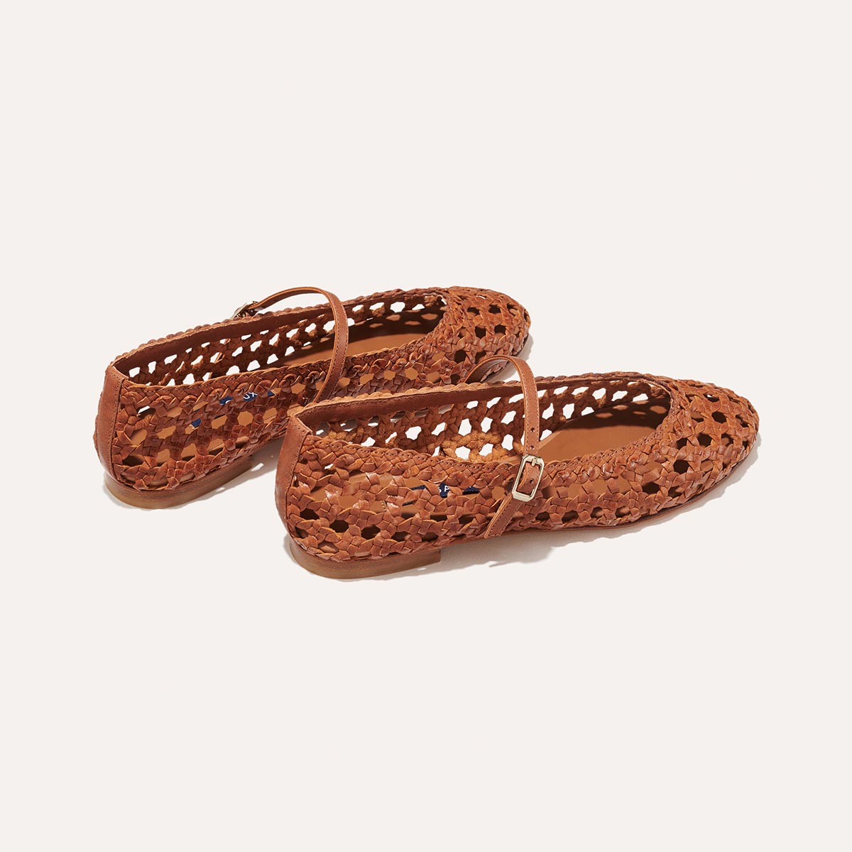The Demi Jane in Saddle Nappa, a ballet flat with a rounded toe and an adjustable strap for a secure fit.