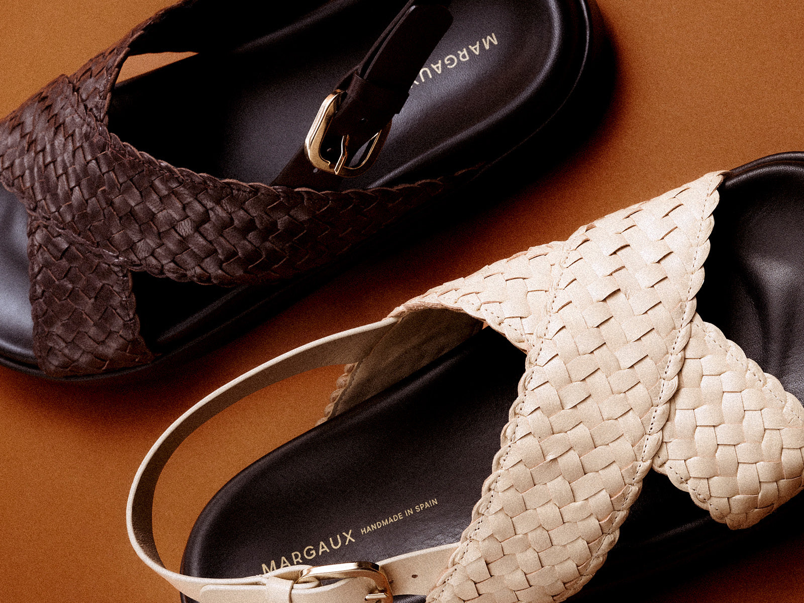 A picture of two woven leather summer sandals