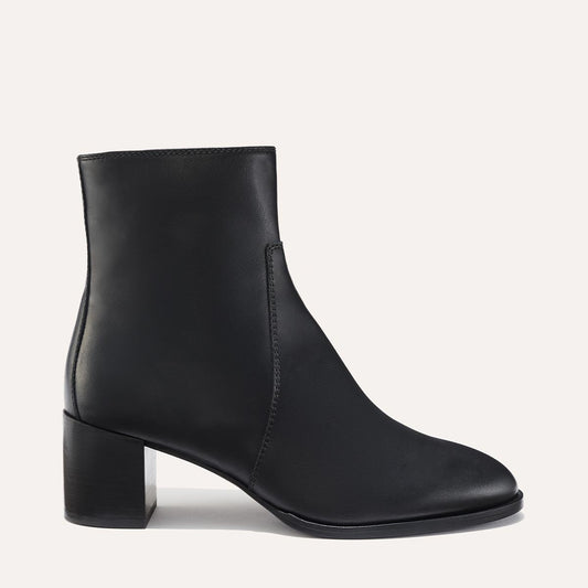 Margaux's classic ankle Boot in black leather with a comfortable block heel