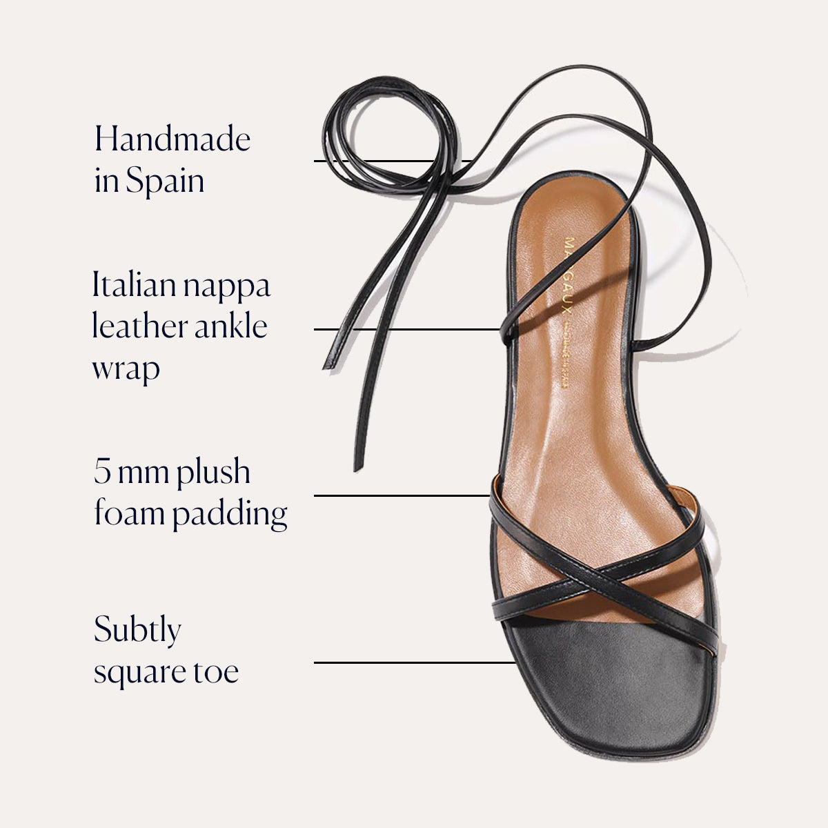 Margaux’s The Wrap Sandal - Black Nappa features crisscross Italian nappa leather straps, a wrap-around ankle tie, subtle square toe, and 5mm foam padding. Handmade in Spain for versatile summer style.