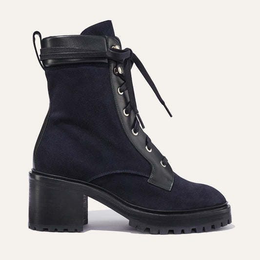 Margaux's classic Skater Boot in weatherproof, dark navy German suede with a rubber lug sole and walkable heel