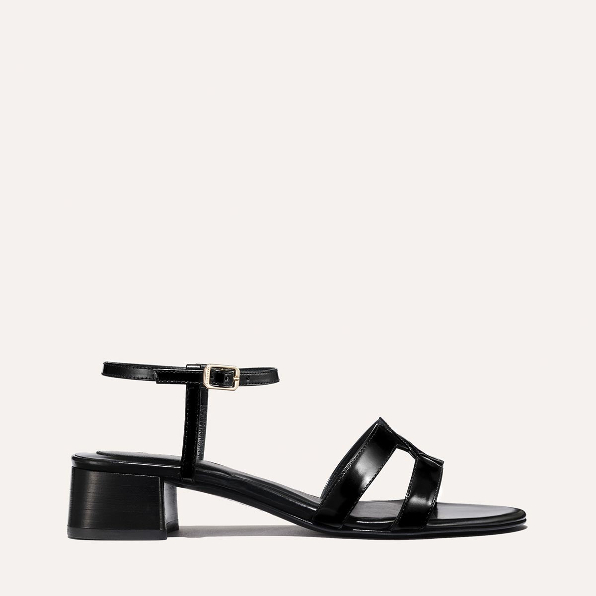 Low heeled sandals shown in black leather