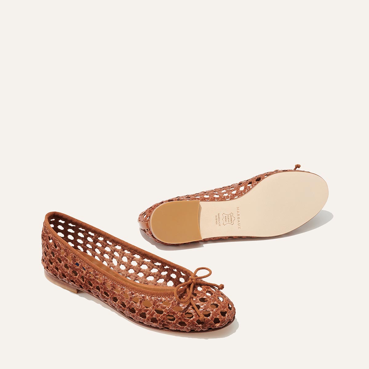 Margaux's classic and comfortable Demi ballet flat, handwoven in India from soft saddle brown leather and finished in Spain