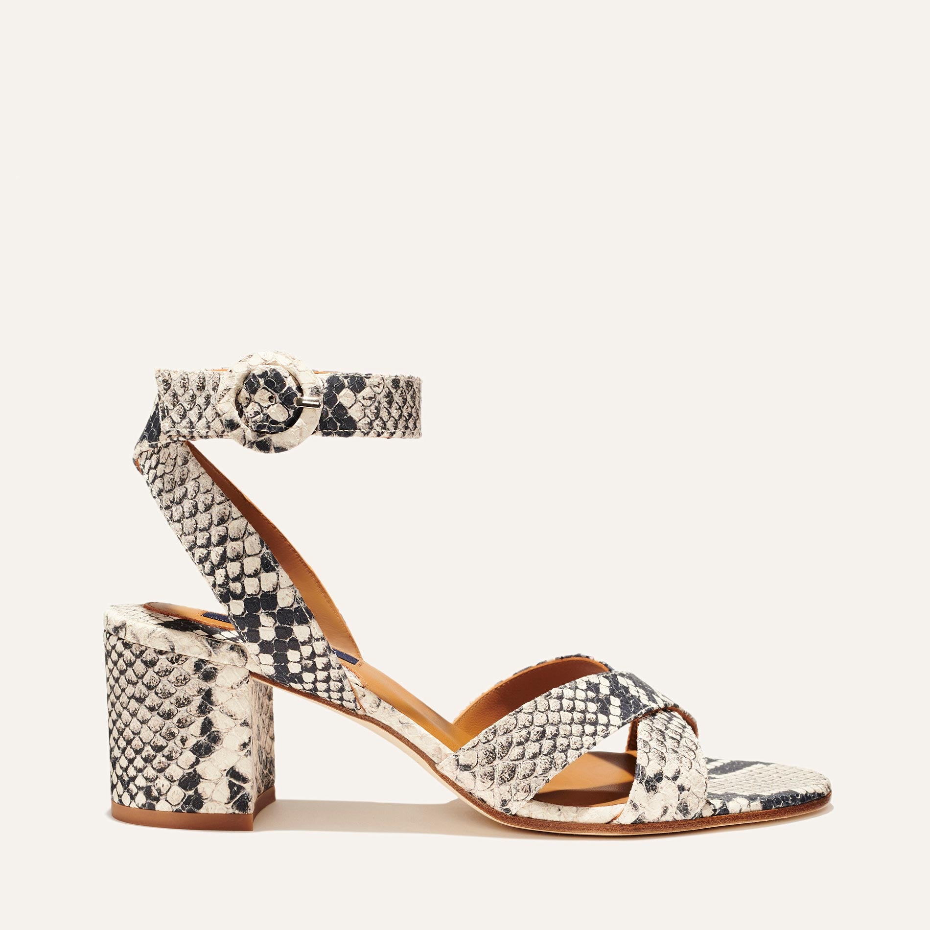Margaux's classic and comfortable City Sandal, made in a python-embossed leather with comfortable straps and a walkable block heel