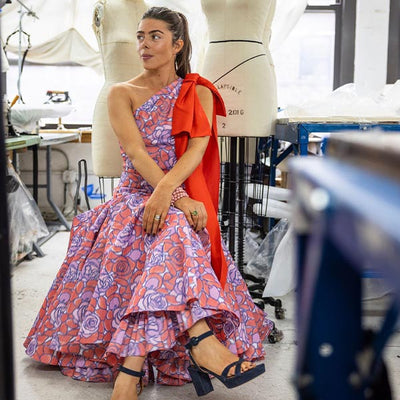New York-based designer Lesea Berry wears Margaux's Platform Sandal in navy suede