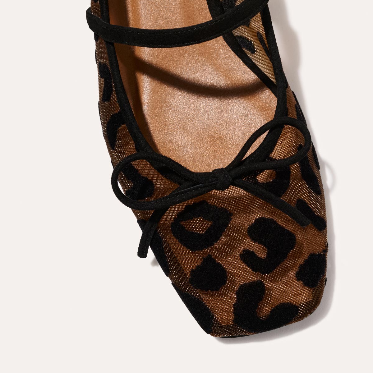 The Ada in Leopard Mesh, a ballet flat with a square toe, comfortable 1-inch block heel and an elastic Mary Jane strap.