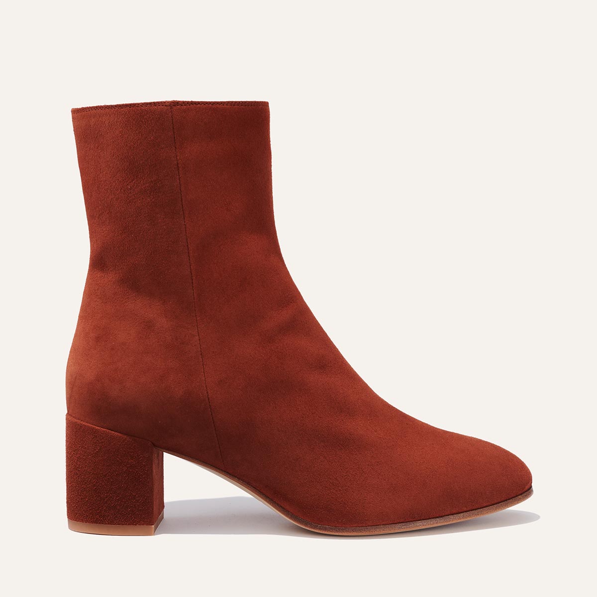 Margaux's classic ankle Boot in brandy suede with a comfortable block heel
