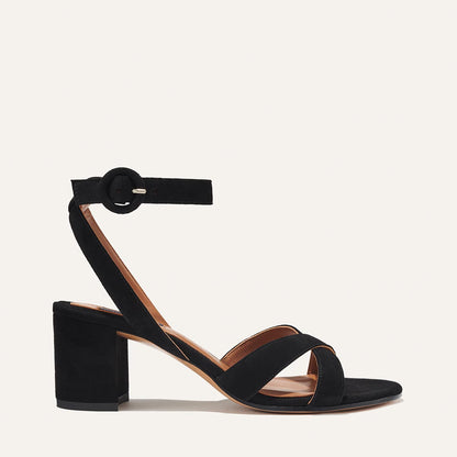 The City Sandal in Black Suede, featuring carefully placed straps, and adjustable ankle strap and a comfortable 2.5-inch block heel.
