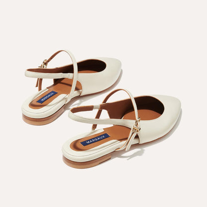 The Cluny Slingback in Ecru Nappa, a ballet flat with a pointed toe, a slingback strap and an adjustable strap across the top of the foot for a secure fit.