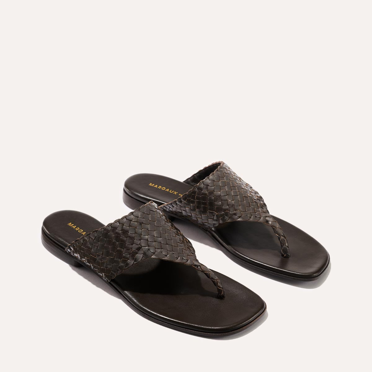 Brown woven leather thong sandals