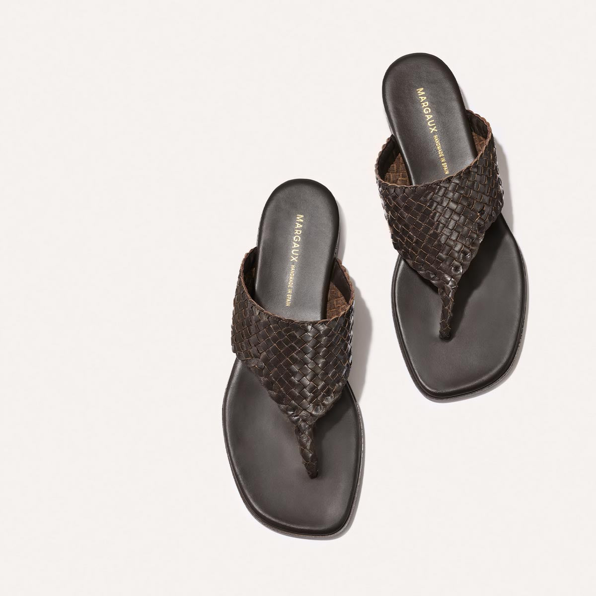 Brown woven leather thong sandals