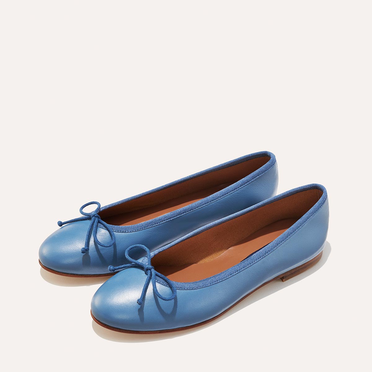 Margaux's classic and comfortable Demi ballet flat, made in a soft, blue Italian nappa leather 