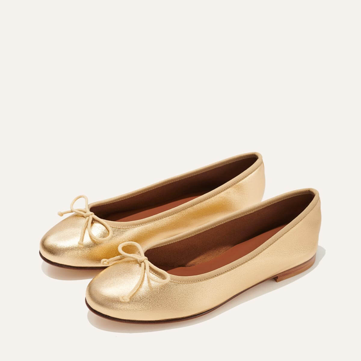 Margaux's classic and comfortable Demi ballet flat, made in a soft, gold Italian nappa leather 