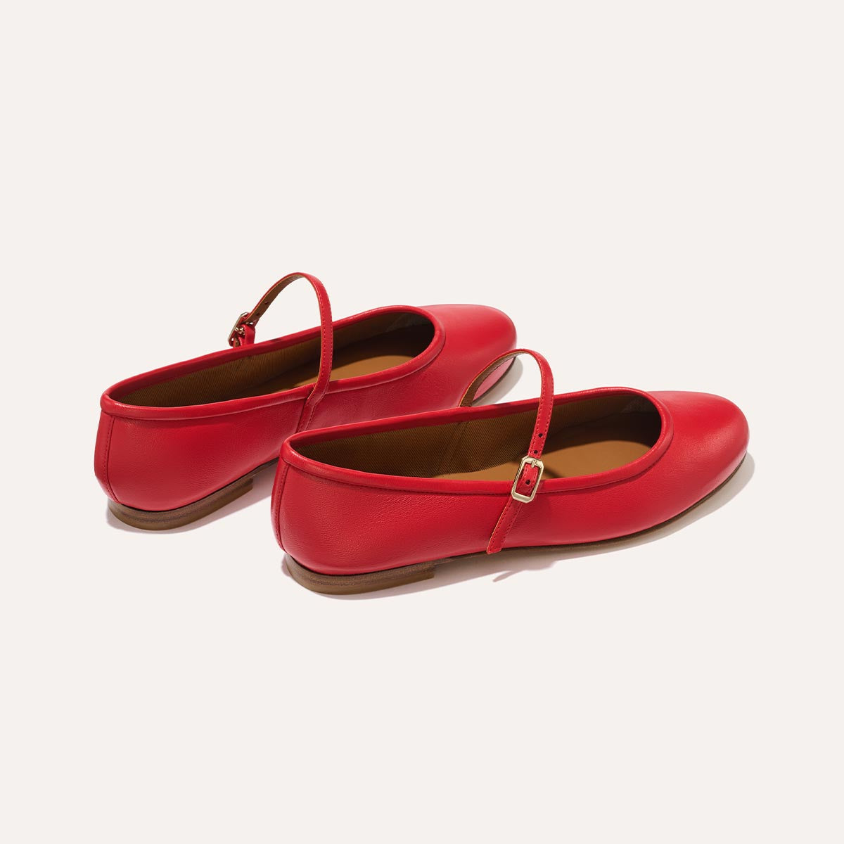 The Demi Jane in buttery soft Scarlet Nappa, a ballet flat with a rounded toe and an adjustable strap for a secure fit.