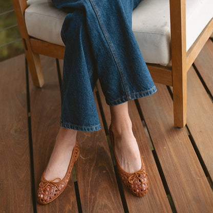 Margaux's classic and comfortable Demi ballet flat, handwoven in India from soft saddle brown leather and finished in Spain