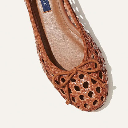 Margaux's classic and comfortable Demi ballet flat, handwoven in India from soft saddle brown leather and finished in Spain