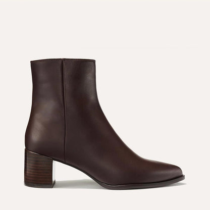 The Downtown Boot in Espresso Calf, a chic ankle-height design complete with a Western-inspired welt and a comfortable 2.5-inch stacked heel.