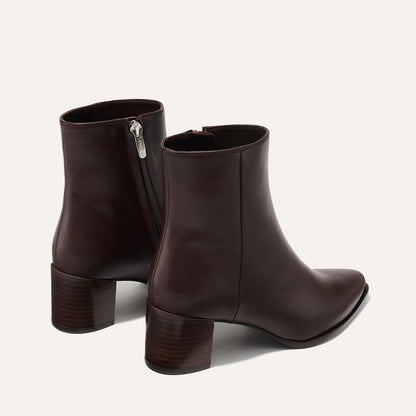 The Downtown Boot in Espresso Calf, a chic ankle-height design complete with a Western-inspired welt and a comfortable 2.5-inch stacked heel.