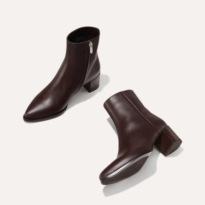 The Downtown Boot in Espresso Calf, a chic ankle-height design complete with a Western-inspired welt and a comfortable 2.5-inch stacked heel.