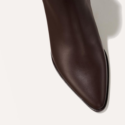 The Downtown Boot in Espresso Calf, a chic ankle-height design complete with a Western-inspired welt and a comfortable 2.5-inch stacked heel.