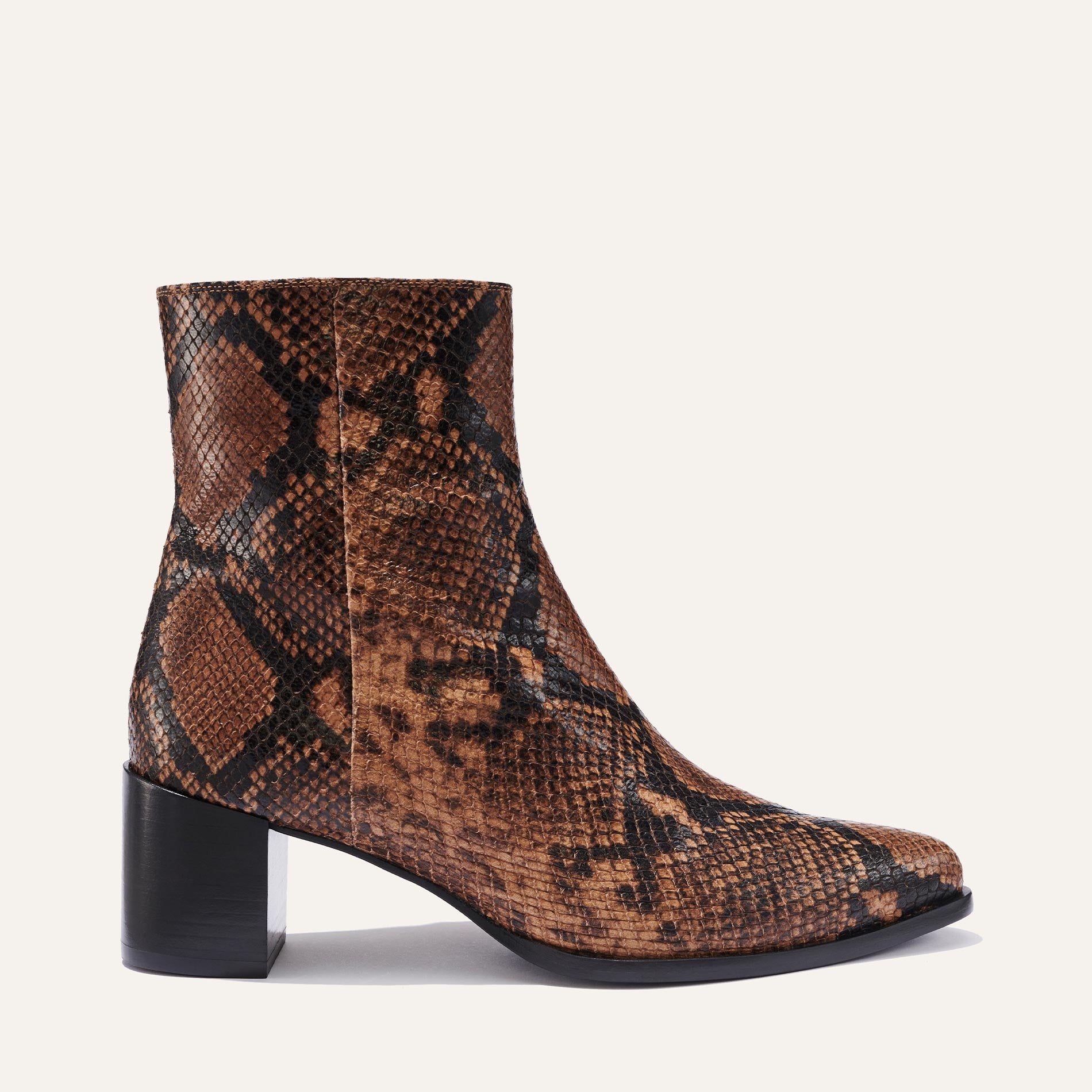 Margaux's classic Downtown Boot in brown python-embossed leather with a comfortable block heel and pointed toe