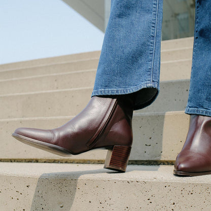 The Downtown Boot in Espresso Calf, a chic ankle-height design complete with a Western-inspired welt and a comfortable 2.5-inch stacked heel.