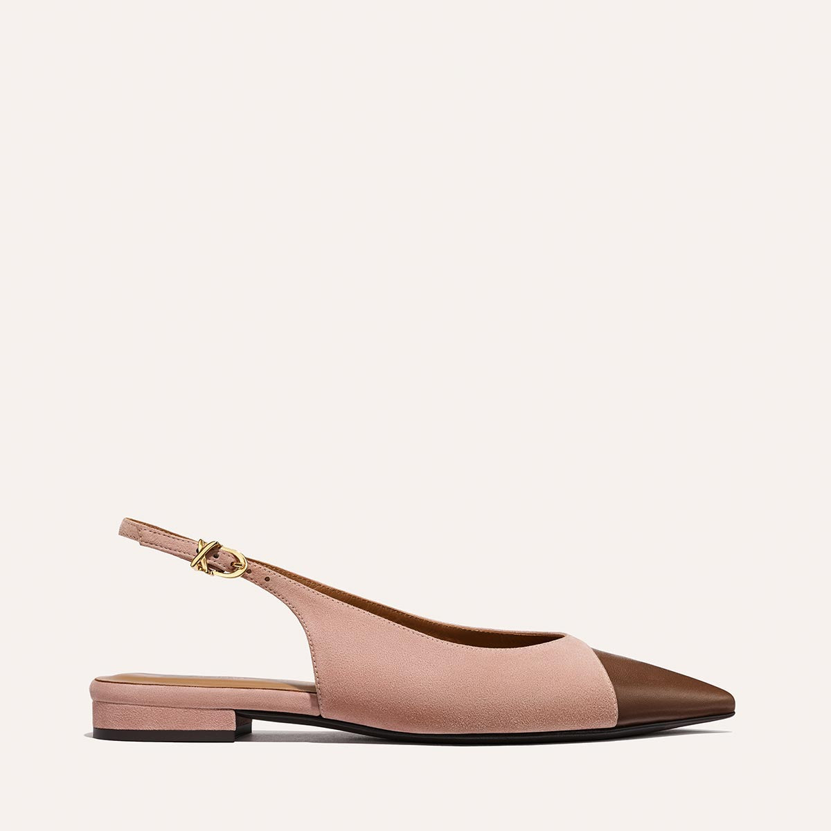 The Elise by margaux-development features a pointed-toe slingback flat in dusty rose suede with a chocolate nappa cap toe and a gold buckle on the adjustable heel strap, shown against a plain light background.