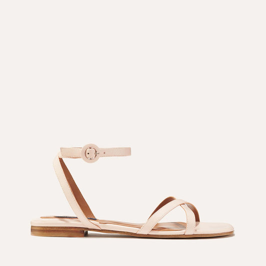 Margaux's classic and comfortable Flat Sandal, made in Spain from soft, magnolia pink Italian nappa leather