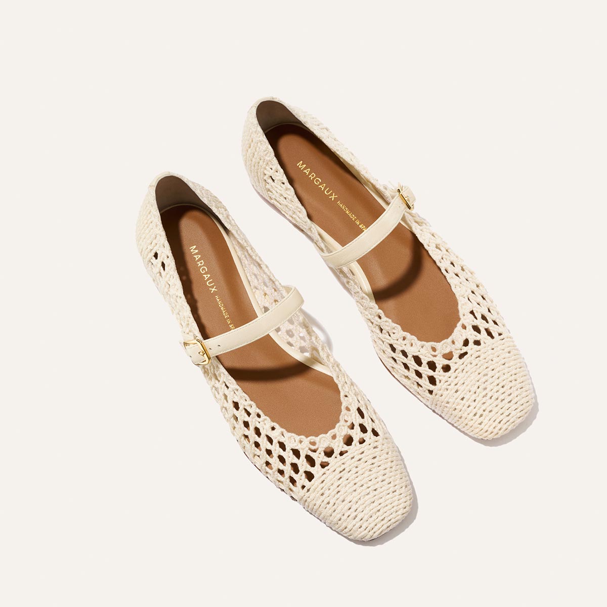 The Fonteyn Jane - Ecru Macrame by Margaux: cream woven cotton macrame ballerina flats with closed toes and adjustable Mary Jane straps, shown on a light background.