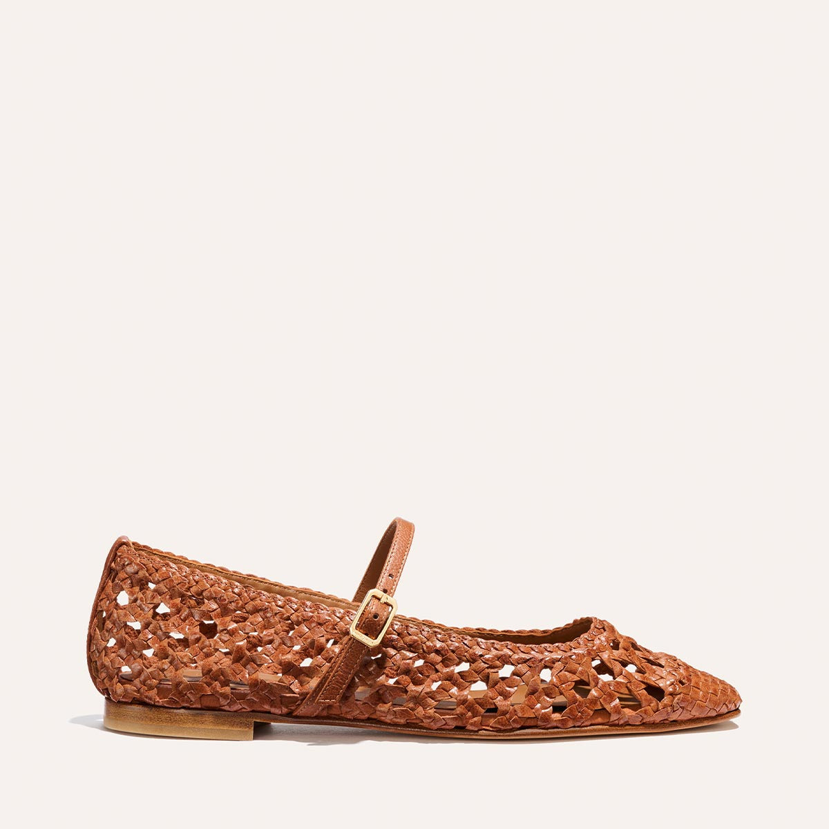 The Fonteyn Jane - Saddle Woven Leather by Margaux: A brown handwoven leather pointed-toe ballerina flat with a low heel and adjustable strap, shown on a plain light background.