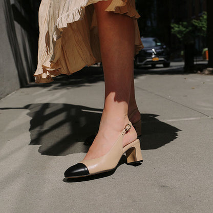 The Cluny Slingback in Dune Nappa, featuring a sleek captoe detail with an adjustable buckle and a comfortable 2.5-inch black heel.