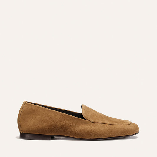 The James Loafer - Cedar Suede by Margaux is showcased against a plain light background, featuring a classic slip-on design, supple tan suede construction, low heel, and smooth finish for refined comfort and a tailored fit.