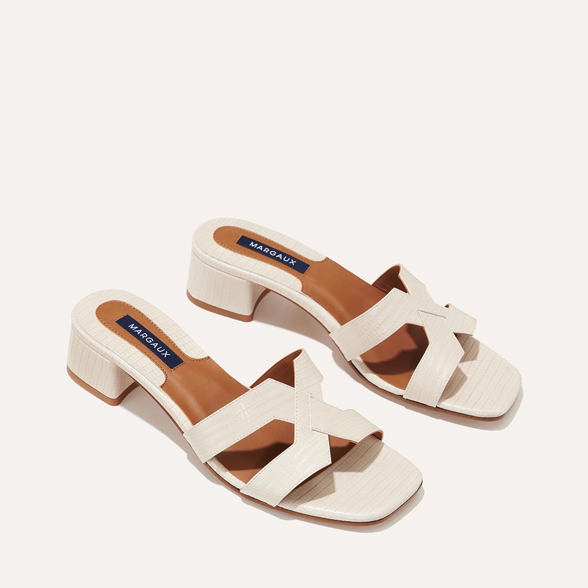 Margaux's classic and comfortable MX 35 Sandal, made in Spain from ecru lizard-embossed Italian leather with a walkable block heel