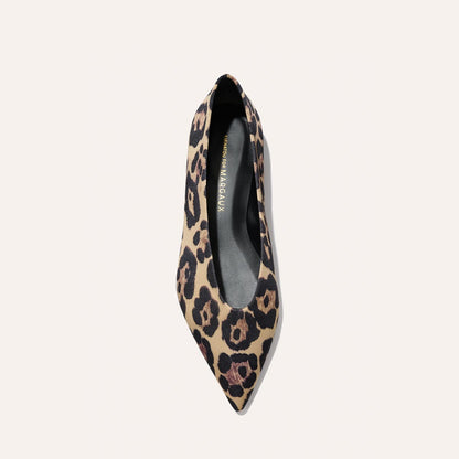 The Parra - Leopard Satin by margaux-development: a pointed-toe flat in beige and black leopard satin, viewed from above on a light background. The black insole features gold branding.