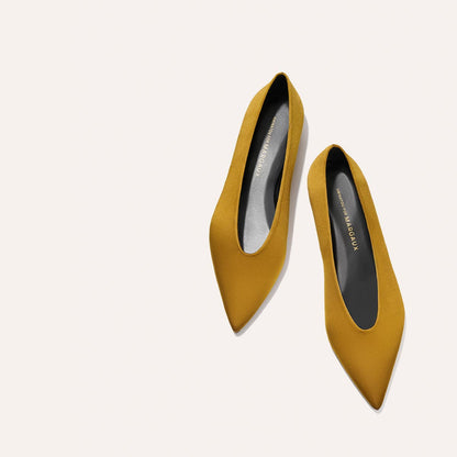 The Parra - Ochre Satin by margaux-development: mustard yellow pointed-toe flats with black insoles, shown on a plain light background.