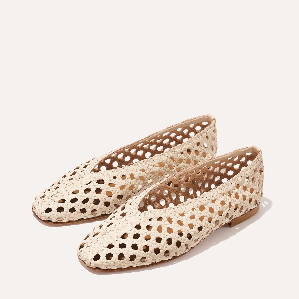 Ecru leather woven flats