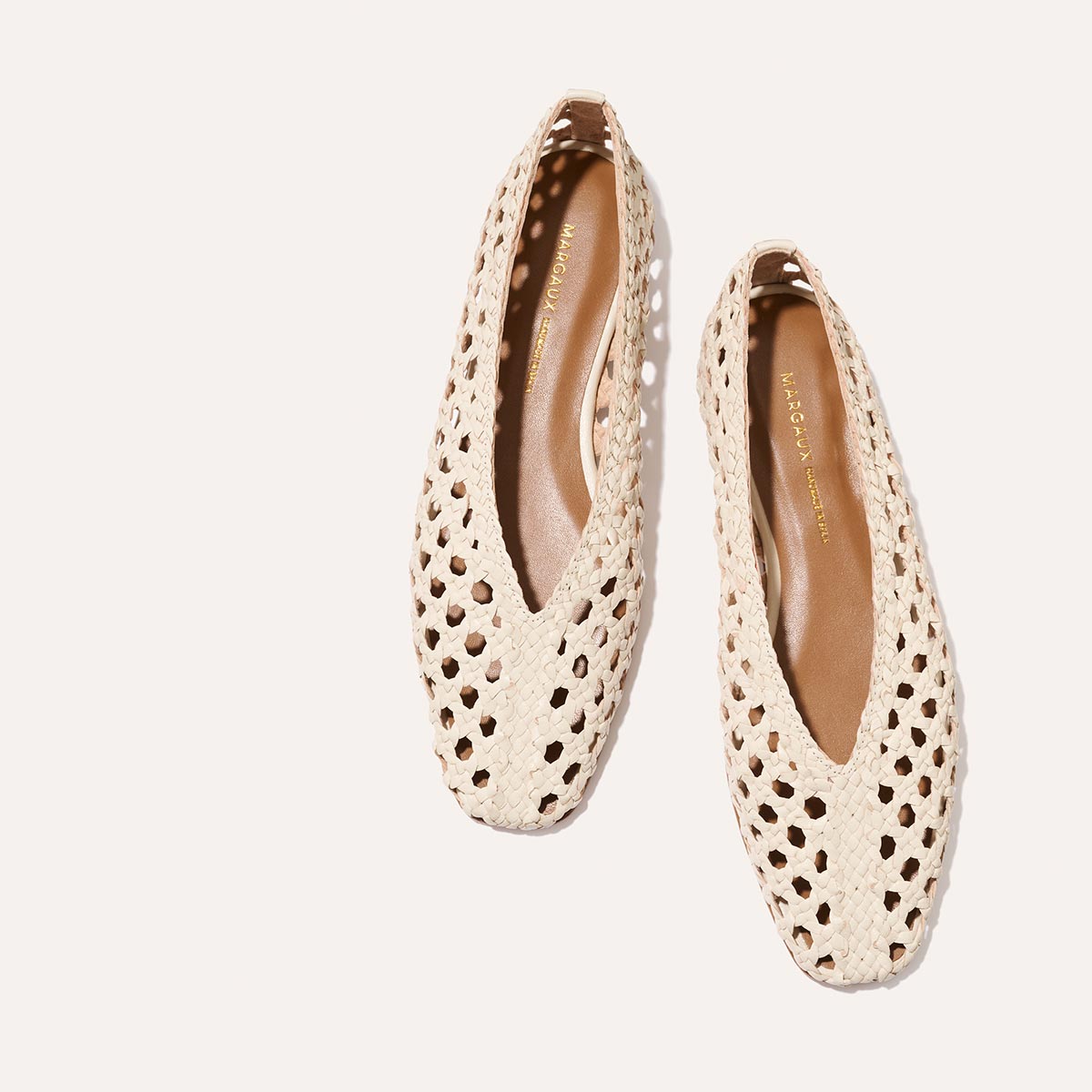 Ecru leather woven flats