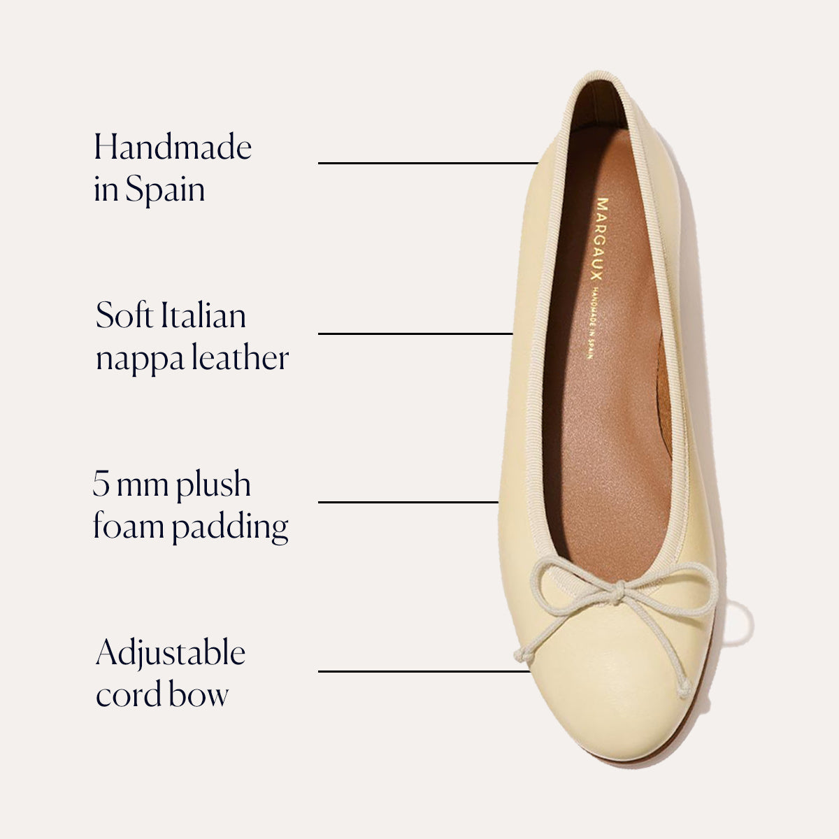 The margaux-development Demi - Butter Nappa ballet flat, shown from above, features soft Italian nappa leather in a cream hue, handmade in Spain with 5 mm plush foam padding and an adjustable cord bow for extra comfort.