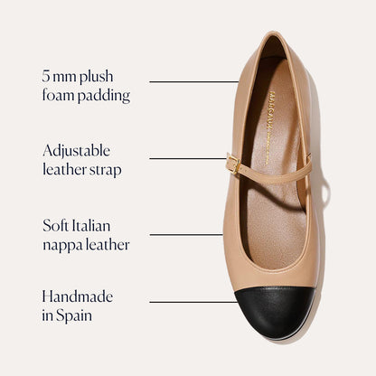 The Demi Jane - Dune and Black Nappa by margaux-development features soft Italian nappa leather, 5 mm foam padding, an adjustable strap, and a chic nude and black design. Handmade in Spain for timeless sophistication.