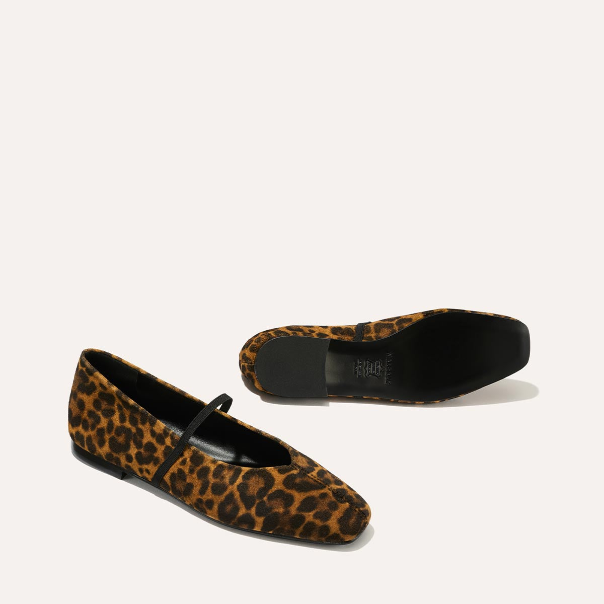 The Phoebe in luxe Leopard Suede, a ballet flat with a squared off toe, high vamp and elastic Mary Jane strap.