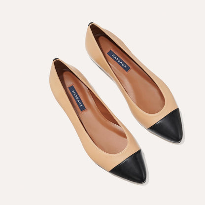 The Pointe in dune nappa, a classic and comfortable ballet flat featuring a refined pointed toe design and nappa leather cap-toe detail.