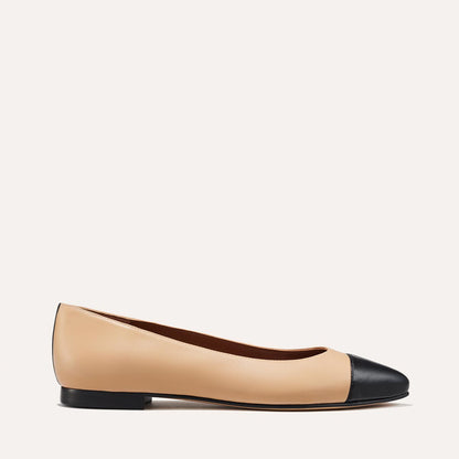 The Pointe in dune nappa, a classic and comfortable ballet flat featuring a refined pointed toe design and nappa leather cap-toe detail.