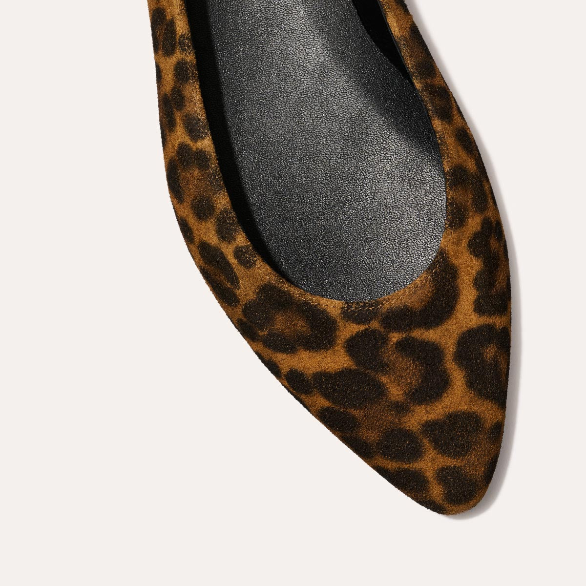 The Pointe in leopard printed suede, a classic and comfortable ballet flat featuring a refined pointed toe design.