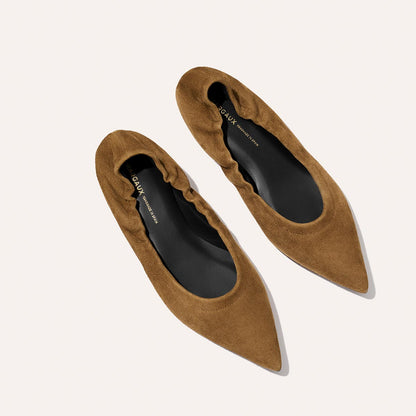 The Roma - Cedar Suede by Margaux: brown pointed-toe suede ballet flats with gathered detailing, shown on a light background. Black insoles feature subtle gold branding for a refined update to the classic ballet flat.