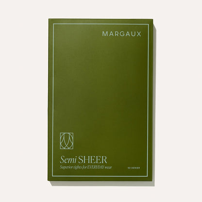 Olive green Margaux packaging for Semi-Sheer Tights - Black features white minimalist text and border. The label reads: “Semi SHEER Superior tights for EVERYDAY wear” with “50 DENIER” at the bottom right—perfect with Margaux boots.