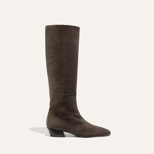 The Sierra Knee-High Boot in English Brown Suede, a Western-inspired style with a pointed toe and a low block heel.